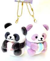 The Panda Buddy Magnetic Plush Keychain – your adorable companion wherever you go! This charming keychain features a lovable panda design, complete with magnetic hands for easy attachment to any metallic surface. Crafted with soft, plush materials, it's perfect for adding a touch of cuteness to your keys, backpack, or fridge.